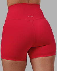 Woman wearing Elixir Ultra High-Rise 4" Short - Scarlet | Model:Rhiley | Size:S