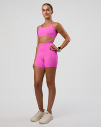Woman wearing Elixir Ultra High-Rise 4" Short - Ultra Fuchsia | Model:Myrte | Size:S