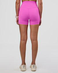 Woman wearing Elixir Ultra High-Rise 4" Short - Ultra Fuchsia | Model:Myrte | Size:S