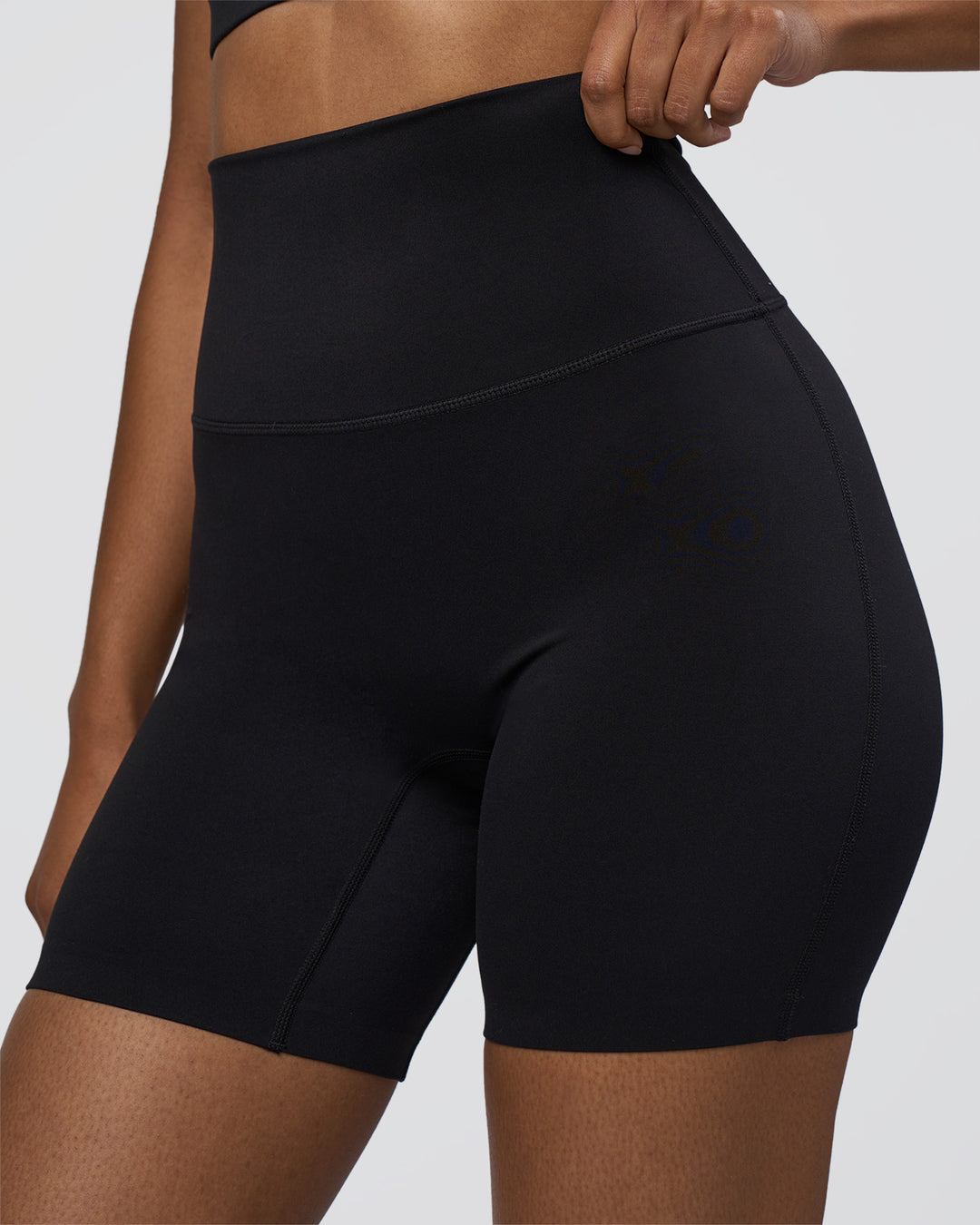 Woman wearing Elixir Ultra High-Rise 6&quot; Short - Black | Model:Jordan | Size:S