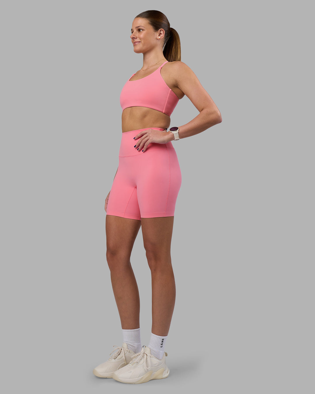 Woman wearing Elixir Ultra High-Rise 6&quot; Short - Candy Pink | Model:Phoebe | Size:S