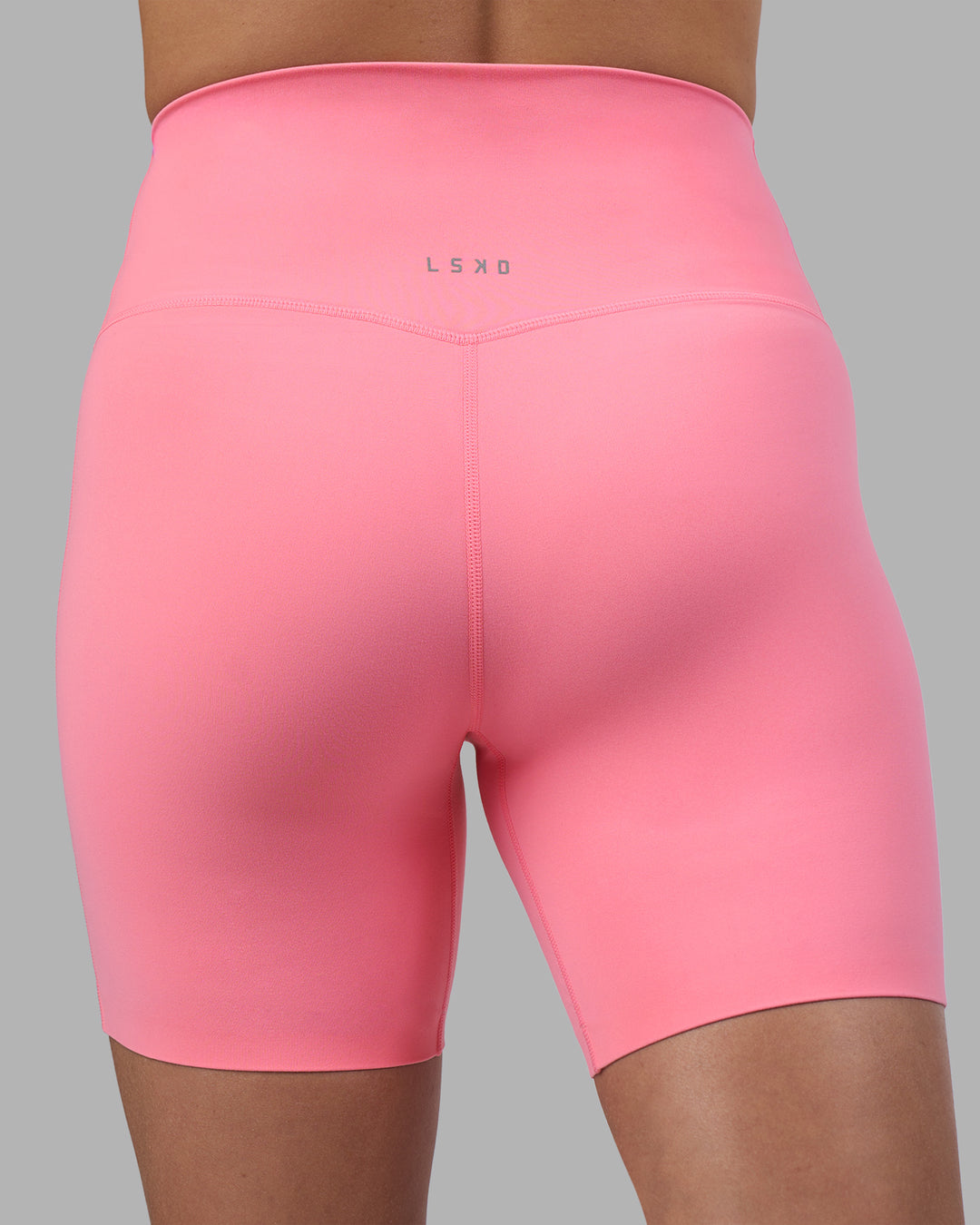 Woman wearing Elixir Ultra High-Rise 6&quot; Short - Candy Pink | Model:Phoebe | Size:S