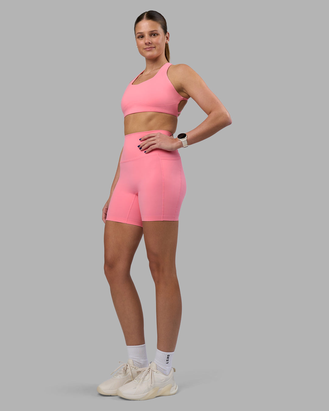 Woman wearing Elixir Ultra High-Rise 6&quot; Short Pockets - Candy Pink | Model:Phoebe | Size:S