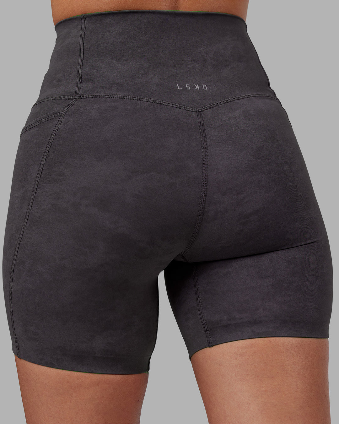 Woman wearing Elixir Ultra High-Rise 6&quot; Short Pockets - Dark Storm Wash | Model:Rhiley | Size:S