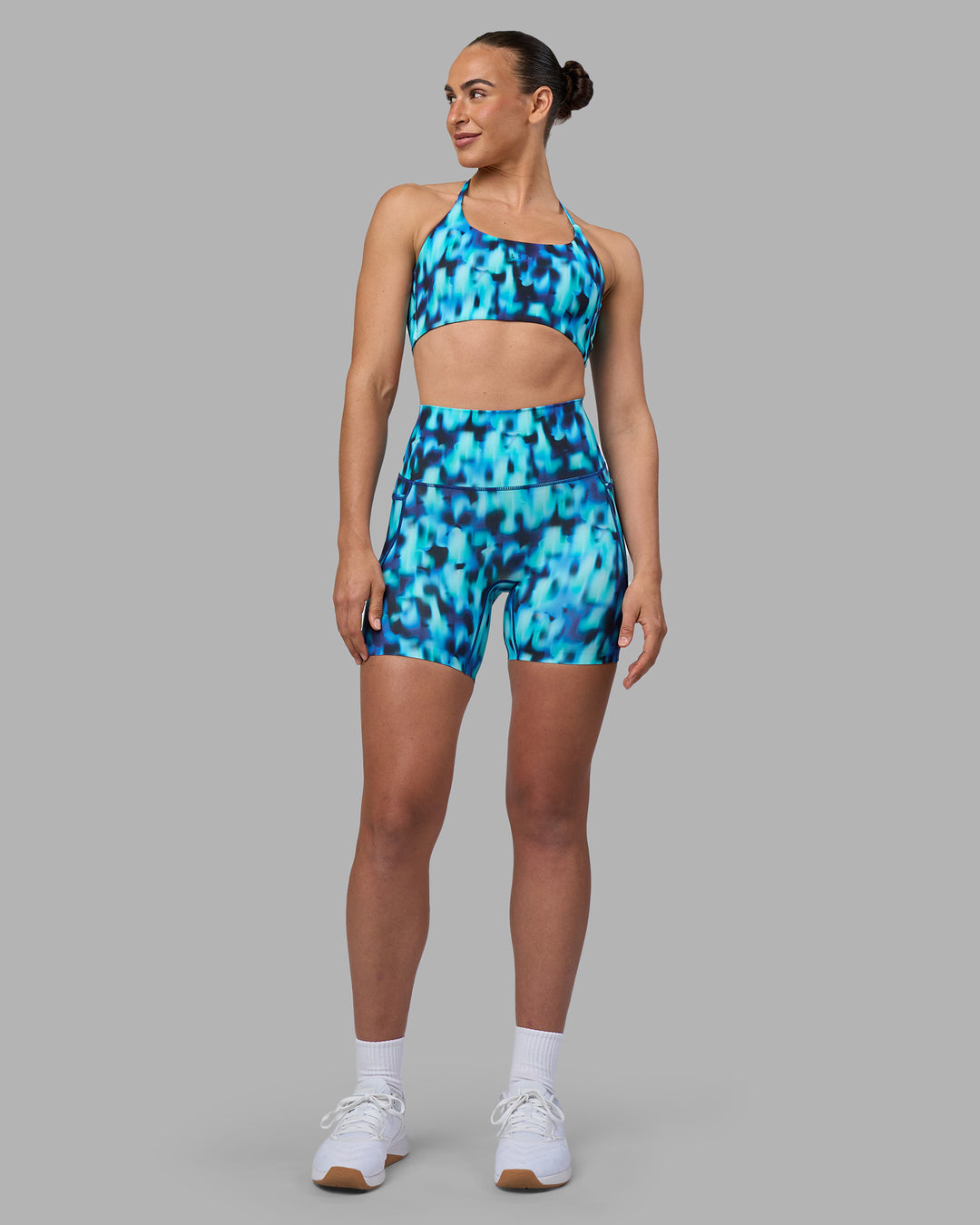 Woman wearing Elixir Ultra High-Rise 6&quot; Short Pockets - Luminous | Model:Sophie | Size:S
