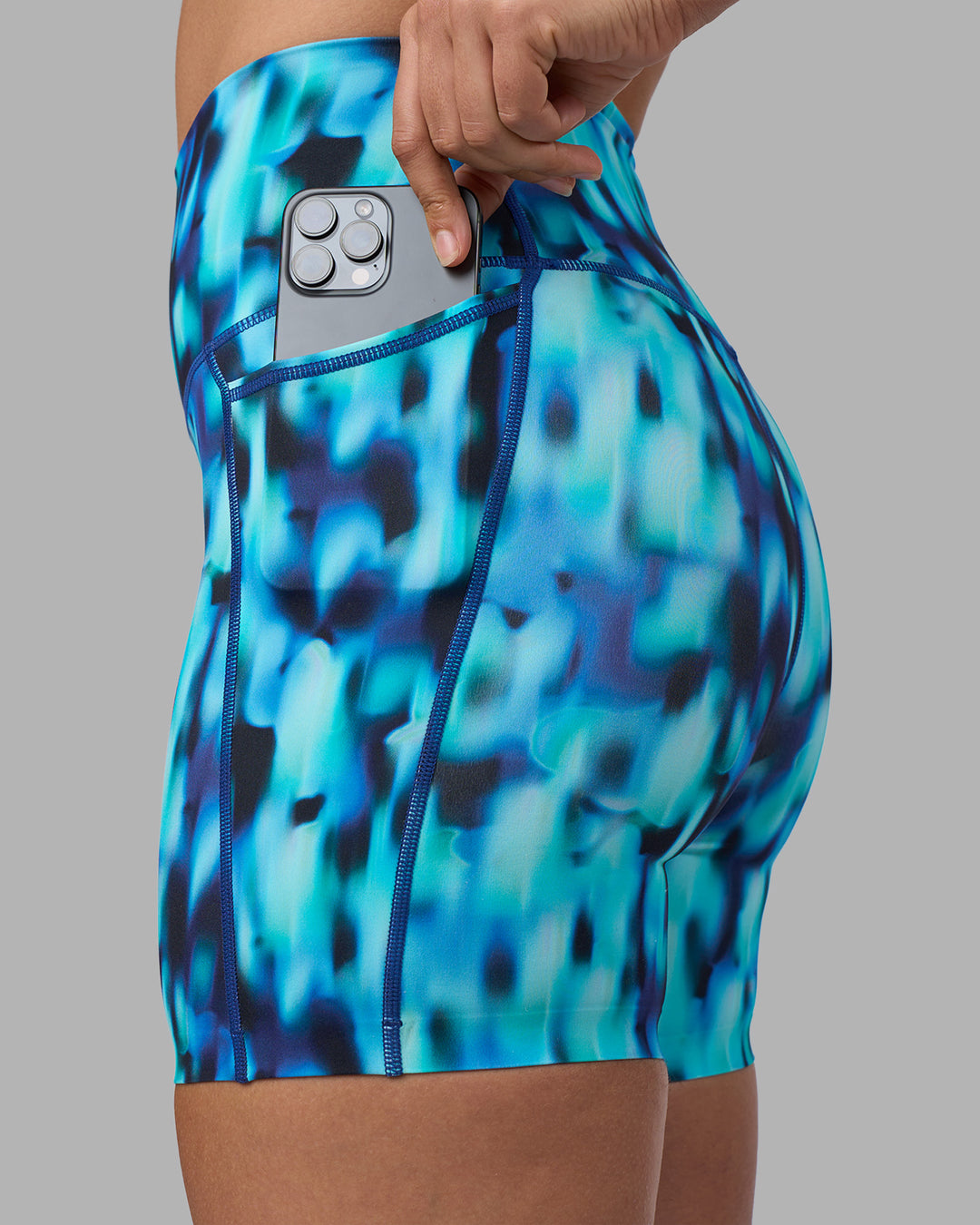 Woman wearing Elixir Ultra High-Rise 6&quot; Short Pockets - Luminous | Model:Sophie | Size:S