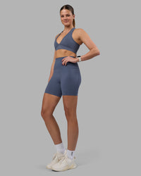 Woman wearing Elixir Ultra High-Rise 6" Short Pockets - Night Shadow | Model:Phoebe | Size:S