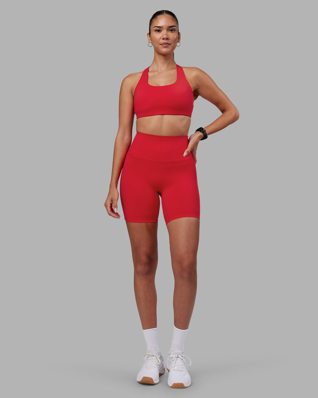 Woman wearing Elixir Ultra High-Rise 6" Short - Scarlet | Model:Rhiley | Size:S