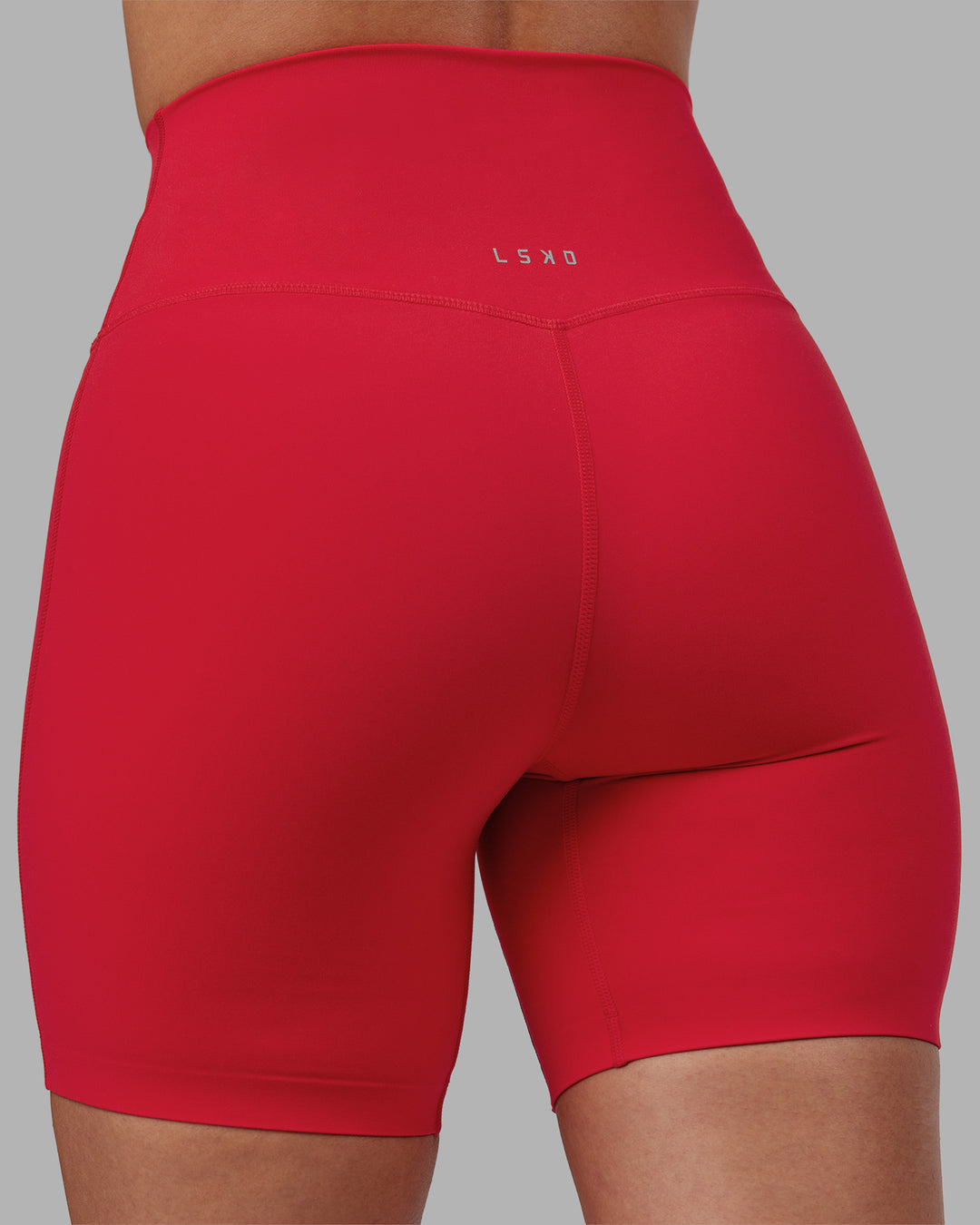 Woman wearing Elixir Ultra High-Rise 6&quot; Short - Scarlet | Model:Rhiley | Size:S