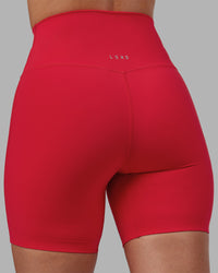 Woman wearing Elixir Ultra High-Rise 6" Short - Scarlet | Model:Rhiley | Size:S