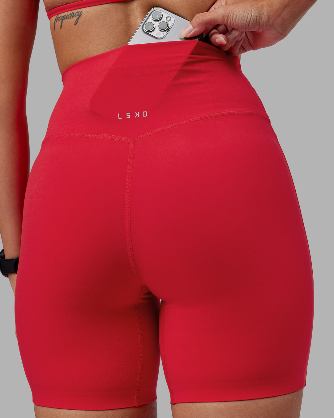 Woman wearing Elixir Ultra High-Rise 6&quot; Short - Scarlet | Model:Rhiley | Size:S