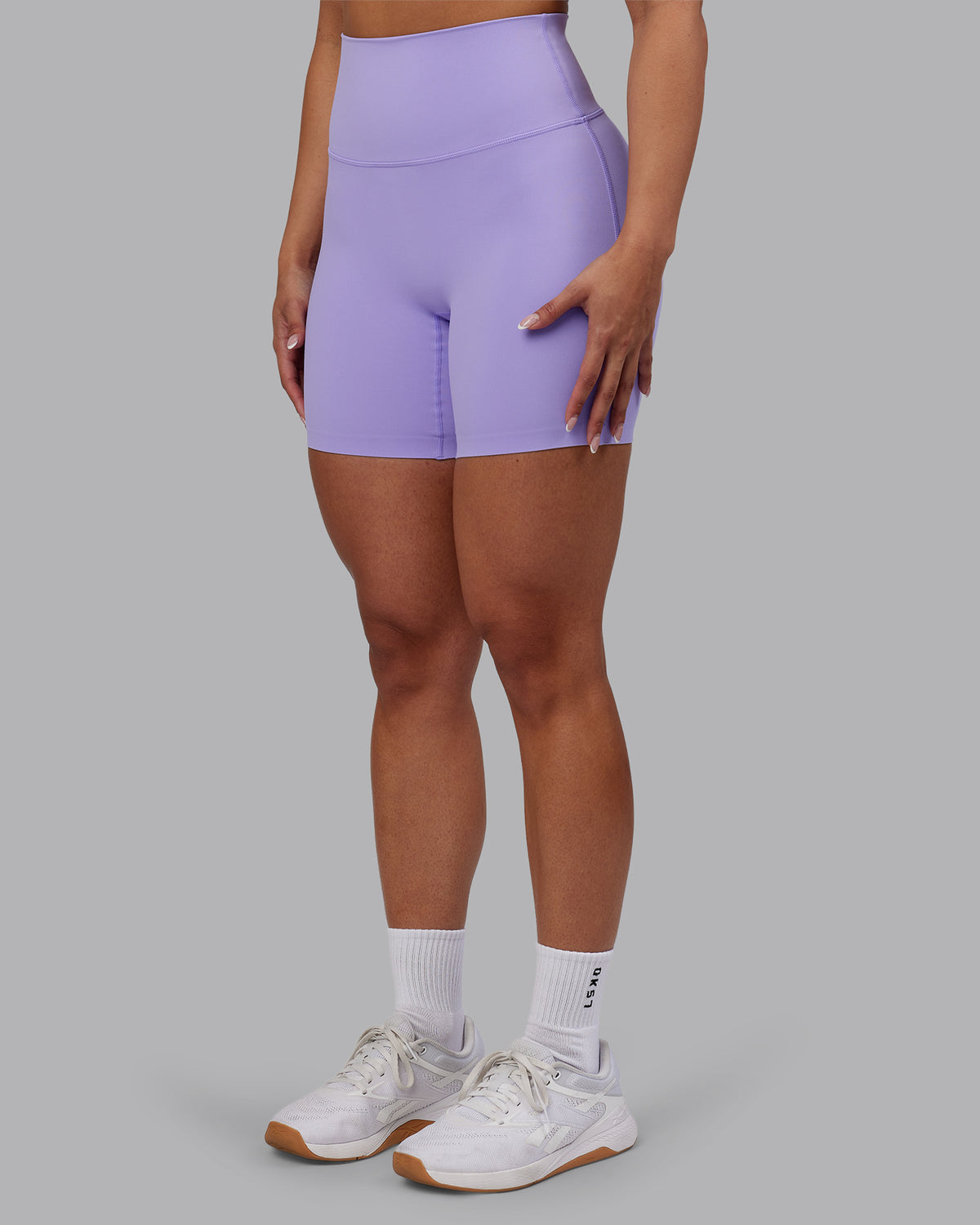 Woman wearing Elixir Ultra High-Rise 6" Short - Violet Ray | Model:Ayla | Size:S