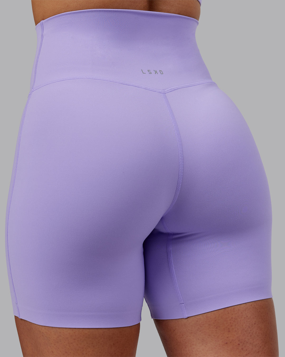 Woman wearing Elixir Ultra High-Rise 6&quot; Short - Violet Ray | Model:Ayla | Size:S