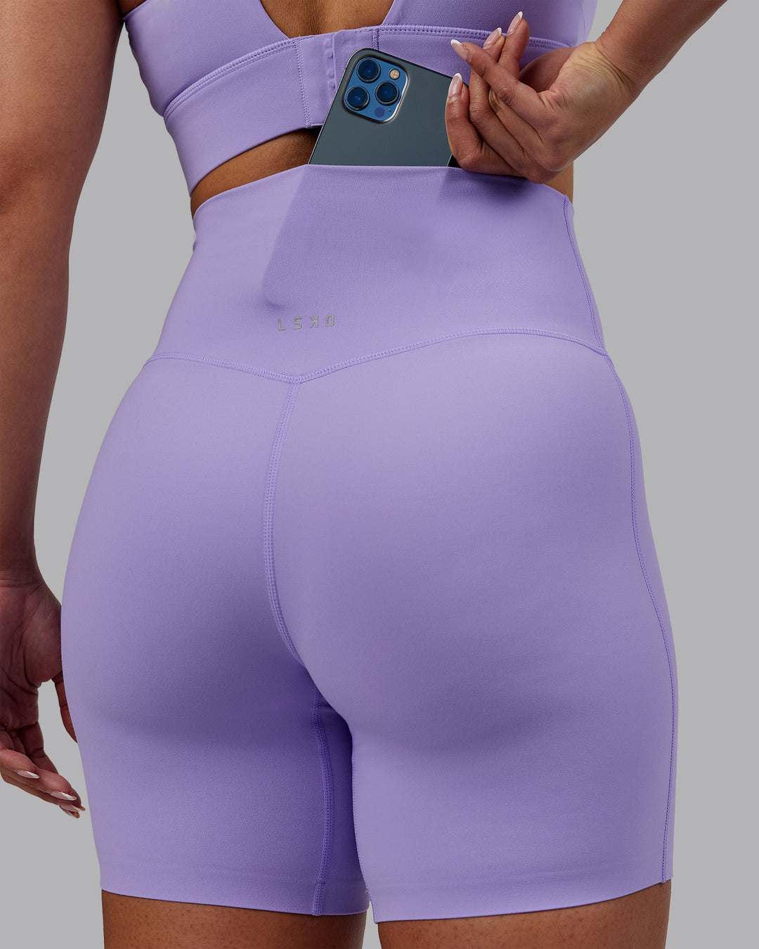 Woman wearing Elixir Ultra High-Rise 6&quot; Short - Violet Ray | Model:Ayla | Size:S