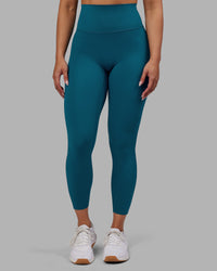 Woman wearing Elixir Ultra High-Rise 7/8 Legging - Blue Coral | Model:Ayla | Size:S