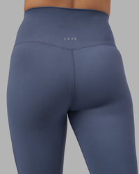 Woman wearing Elixir Ultra High-Rise 7/8 Legging - Night Shadow | Model:Phoebe | Size:S