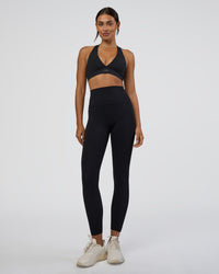 Woman wearing Elixir Ultra High-Rise 7/8 Legging Pockets - Black | Model:Ruby | Size:S