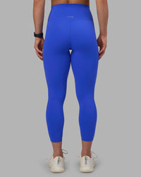 Woman wearing Elixir Ultra High-Rise 7/8 Legging - Power Cobalt | Model:Keisha | Size:S