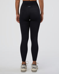 Woman wearing Elixir Ultra High-Rise Full Length Legging - Black | Model:Amity | Size:S
