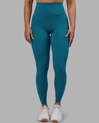 Woman wearing Elixir Ultra High-Rise Full Length Legging - Blue Coral | Model:Ayla | Size:S