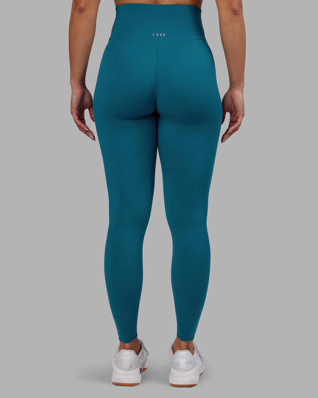 Woman wearing Elixir Ultra High-Rise Full Length Legging - Blue Coral | Model:Ayla | Size:S