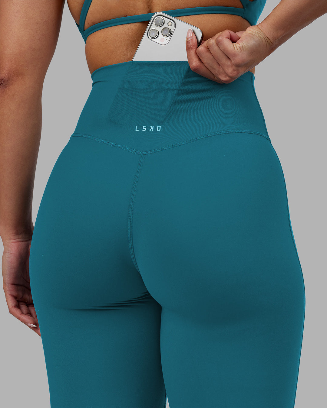 Woman wearing Elixir Ultra High-Rise Full Length Legging - Blue Coral | Model:Ayla | Size:S