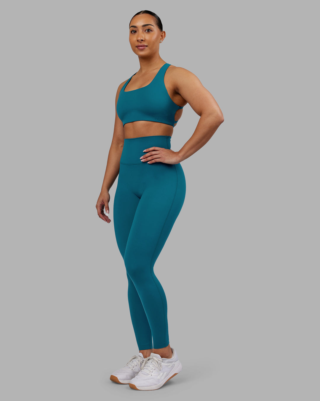 Woman wearing Elixir Ultra High-Rise Full Length Legging - Blue Coral | Model:Ayla | Size:S