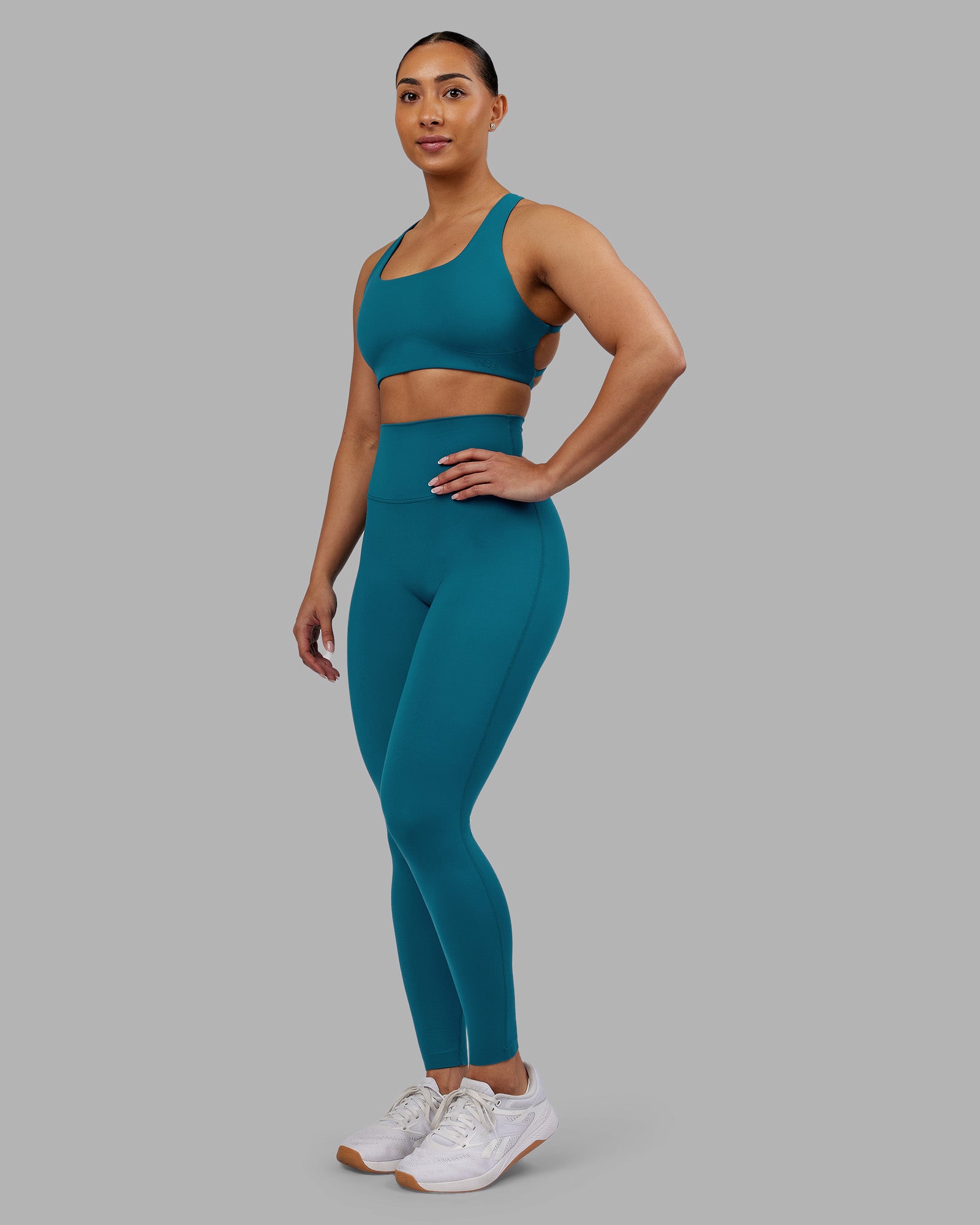 Woman wearing Elixir Ultra High-Rise Full Length Legging - Blue Coral | Model:Ayla | Size:S