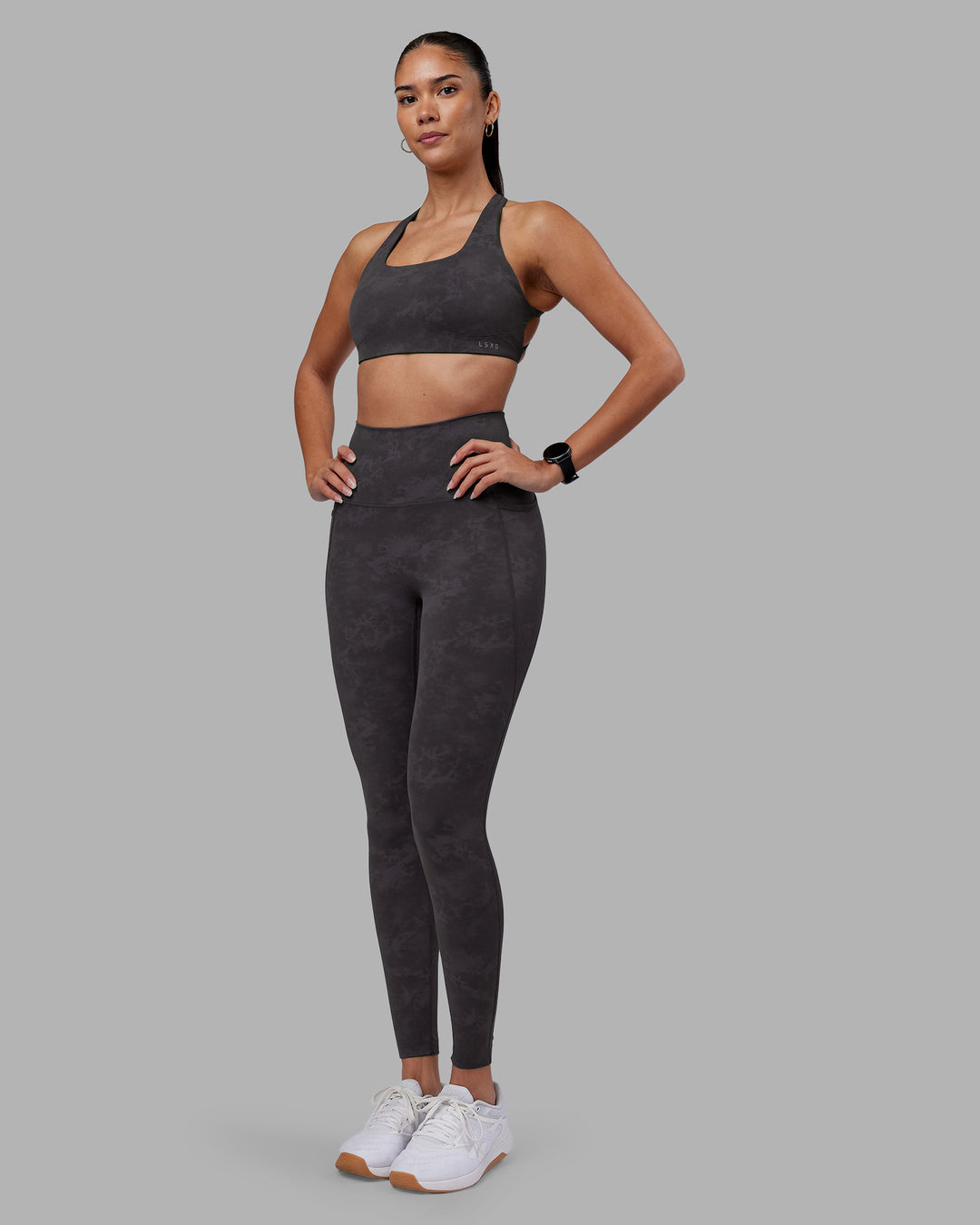 Woman wearing Elixir Ultra High-Rise Full Length Legging Pockets - Dark Storm Wash | Model:Rhiley | Size:S