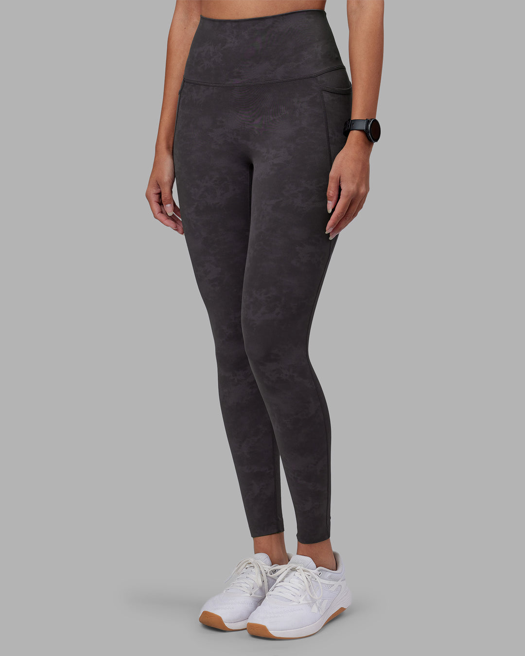 Woman wearing Elixir Ultra High-Rise Full Length Legging Pockets - Dark Storm Wash | Model:Rhiley | Size:S