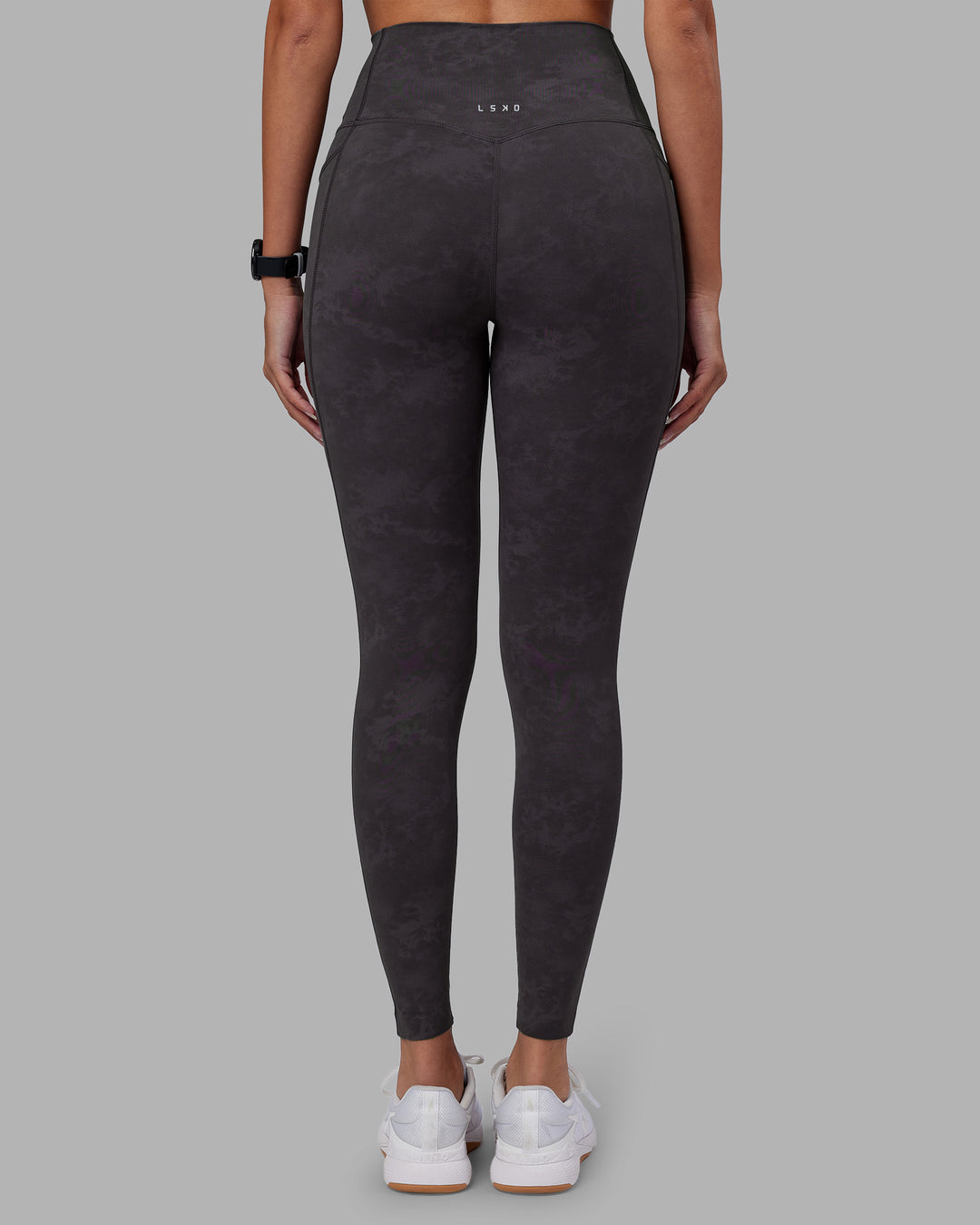 Woman wearing Elixir Ultra High-Rise Full Length Legging Pockets - Dark Storm Wash | Model:Rhiley | Size:S