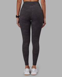 Woman wearing Elixir Ultra High-Rise Full Length Legging Pockets - Dark Storm Wash | Model:Rhiley | Size:S
