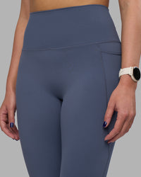 Woman wearing Elixir Ultra High-Rise Full Length Legging Pockets - Night Shadow | Model:Phoebe | Size:S