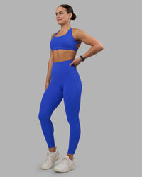 Woman wearing Elixir Ultra High-Rise Full Length Legging - Power Cobalt | Model:Keisha | Size:S