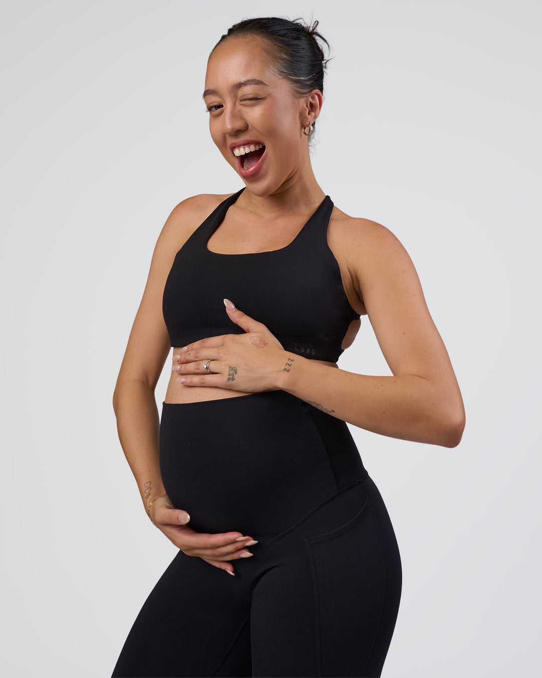 Woman wearing Elixir Ultra High-Rise Maternity Full Length Legging Pockets - Black | Model:Kitahna | Size:S