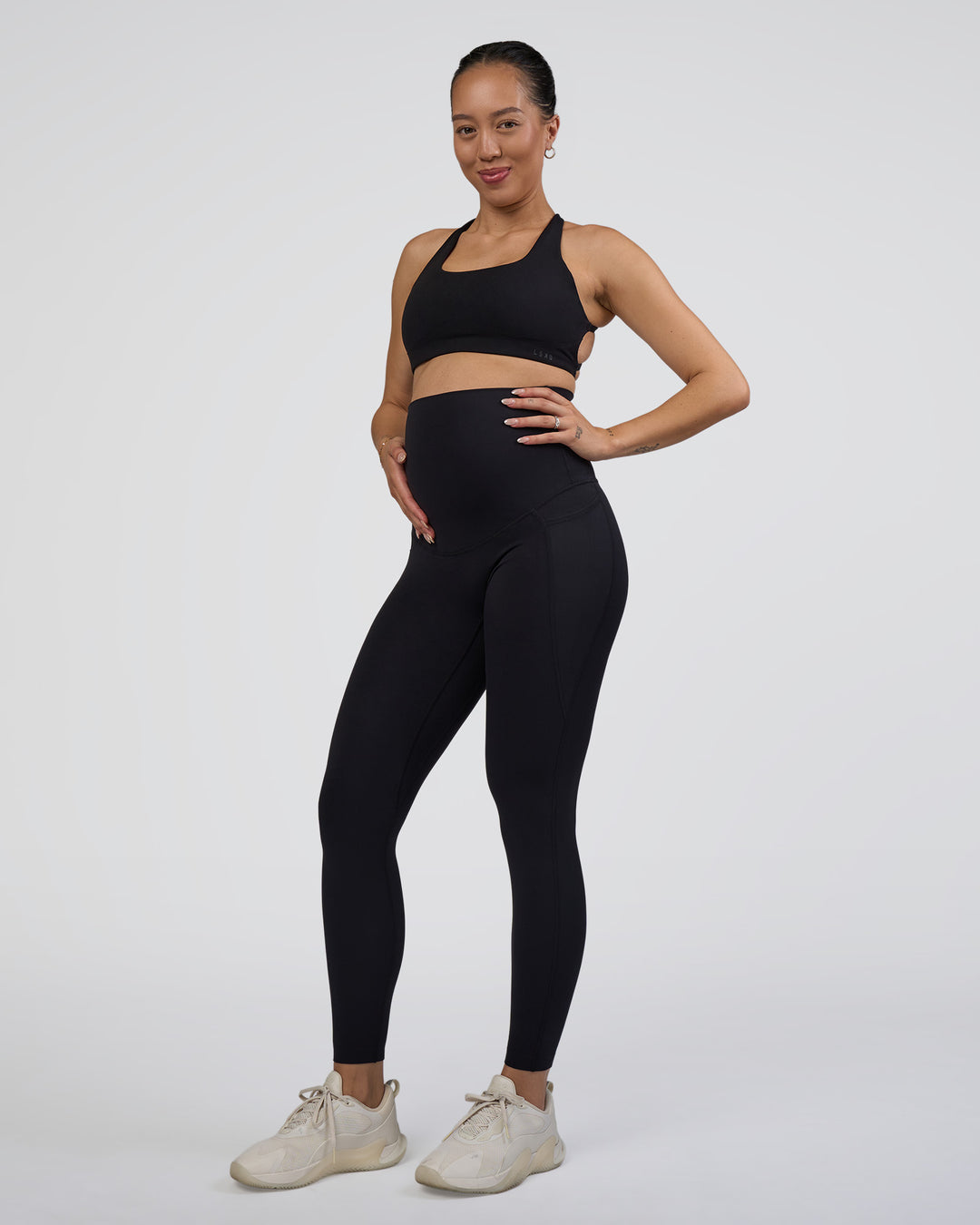Woman wearing Elixir Ultra High-Rise Maternity Full Length Legging Pockets - Black | Model:Kitahna | Size:S