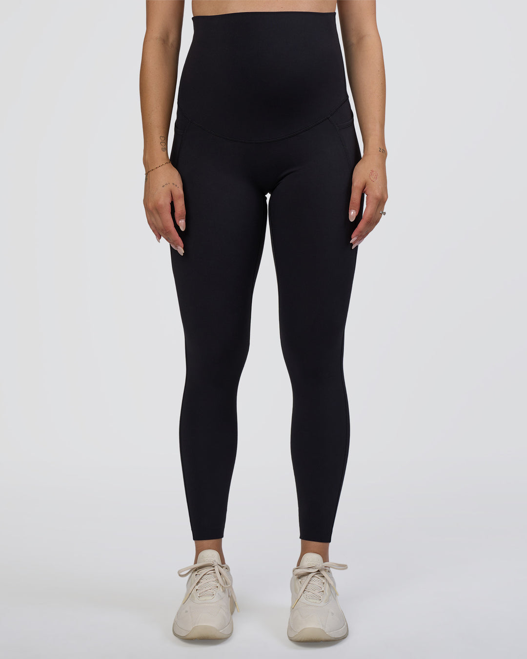 Woman wearing Elixir Ultra High-Rise Maternity Full Length Legging Pockets - Black | Model:Kitahna | Size:S