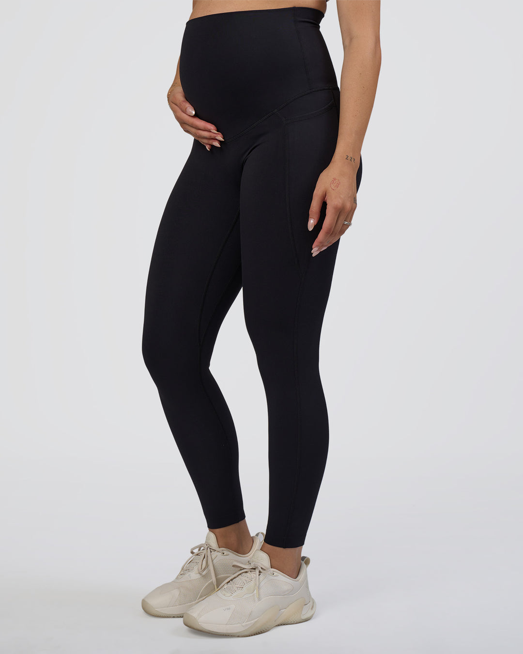Woman wearing Elixir Ultra High-Rise Maternity Full Length Legging Pockets - Black | Model:Kitahna | Size:S