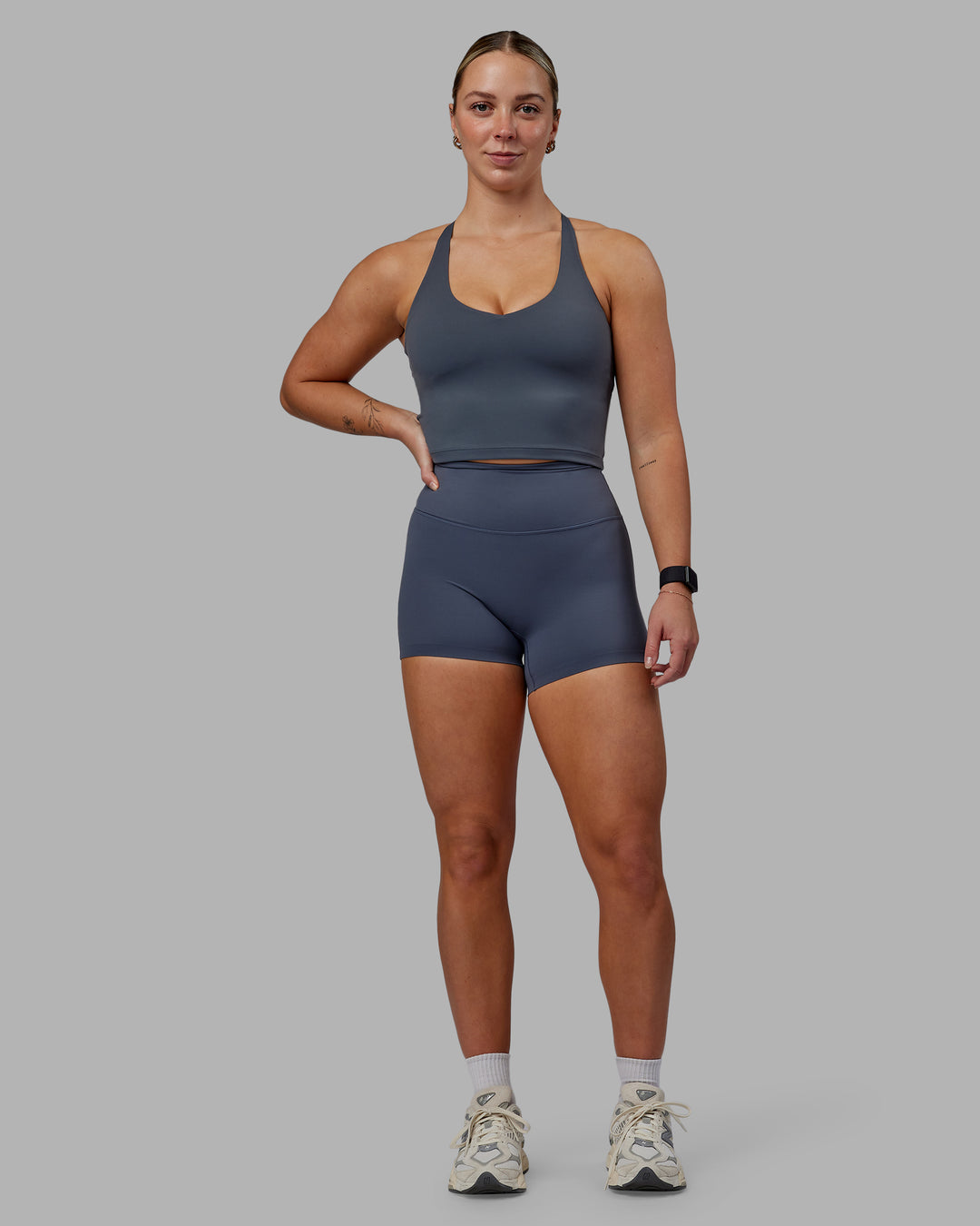 Woman wearing Elixir Ultra High-Rise 4&quot; Short - Turbulence | Model:Suz | Size:S