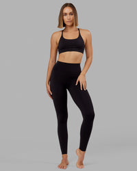 Woman wearing Elixir Ultra High-Rise Tall Legging - Black