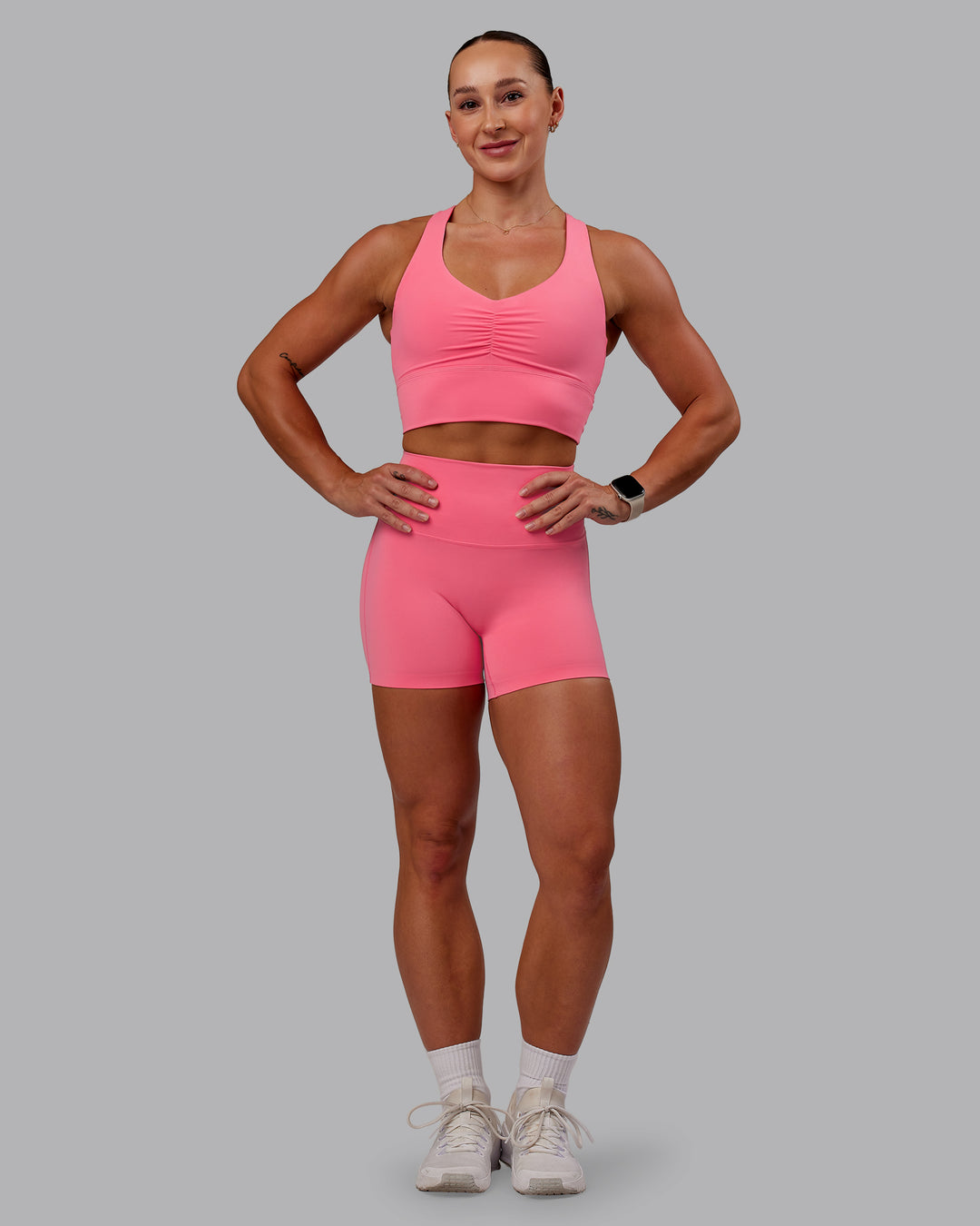 Woman wearing Elixir Ultra High-Rise 4&quot; Short - Pink Lemonade | Model:Amber | Size:S