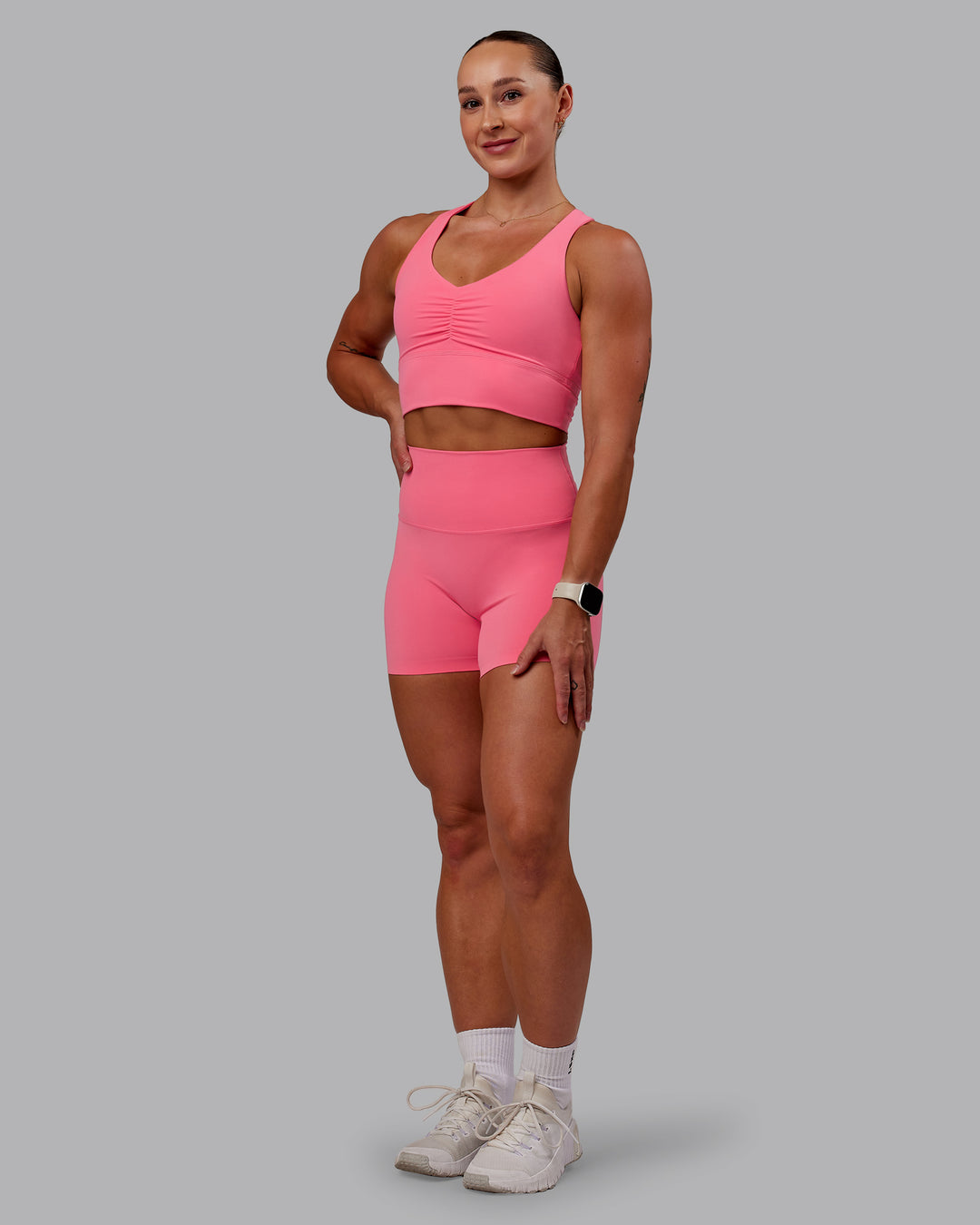 Woman wearing Elixir Ultra High-Rise 4&quot; Short - Pink Lemonade | Model:Amber | Size:S