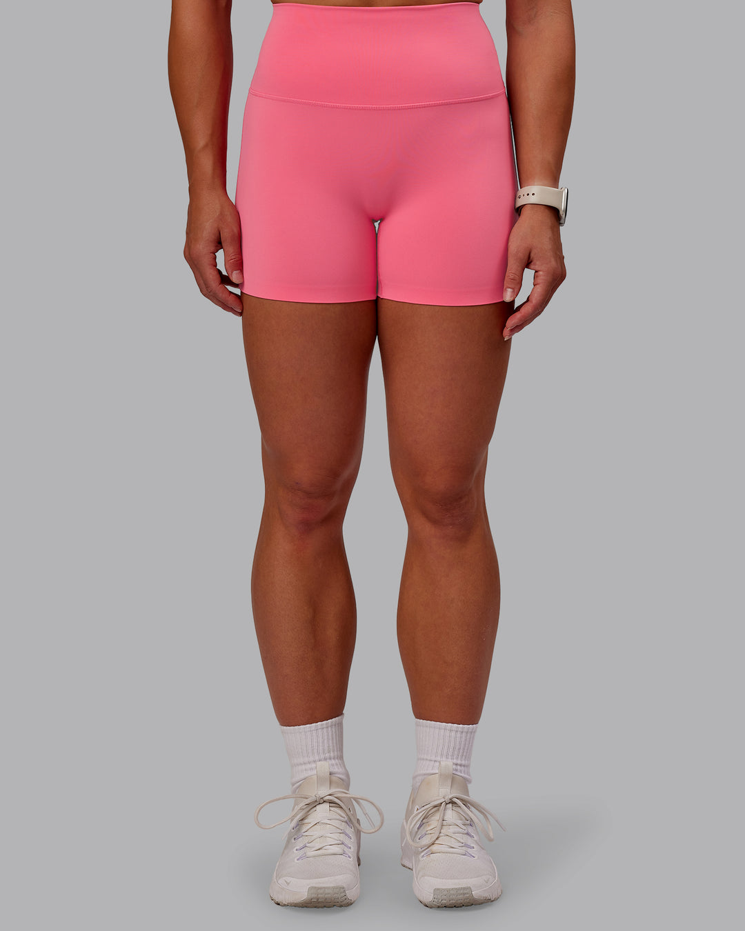 Woman wearing Elixir Ultra High-Rise 4&quot; Short - Pink Lemonade | Model:Amber | Size:S