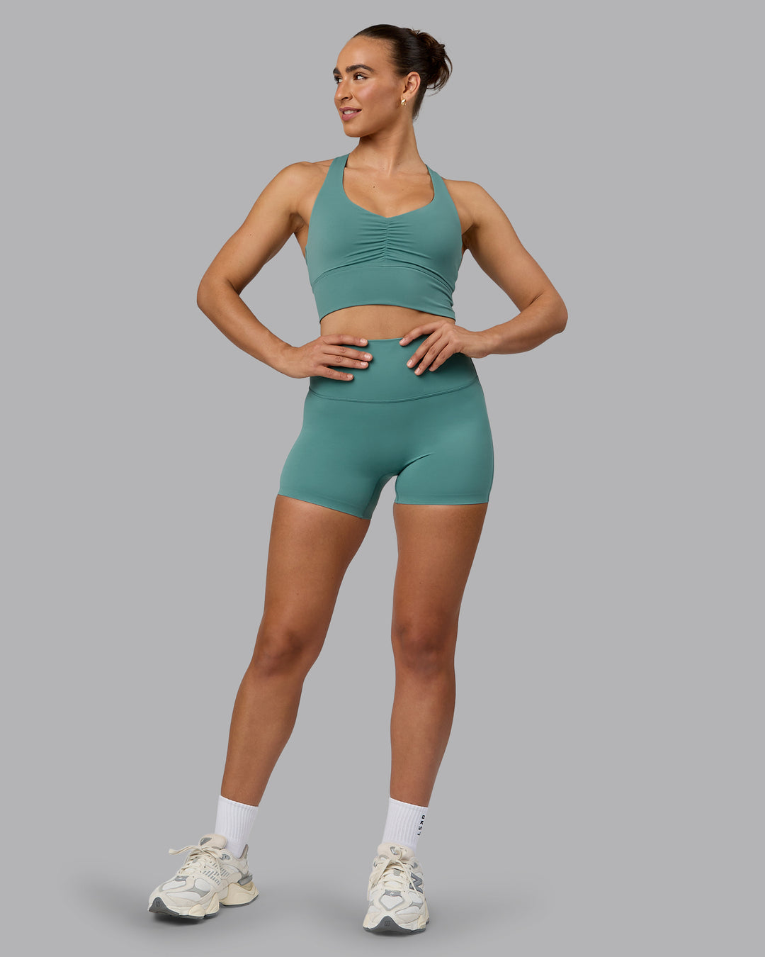 Woman wearing Elixir Ultra High-Rise 4&quot; Short - Sagebrush | Model:Sophie | Size:S