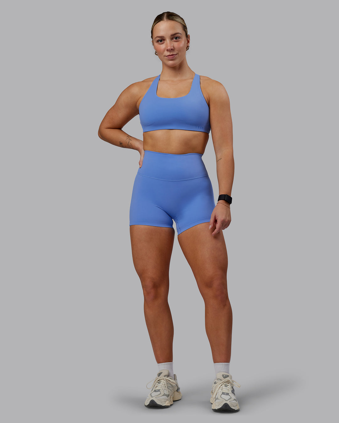 Woman wearing Elixir Ultra High-Rise 4" Short - Ultramarine | Model:Suz | Size:S