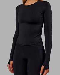 Woman wearing Embrace Thermal Long Sleeve Tee - Black | Model:Ella | Size:S