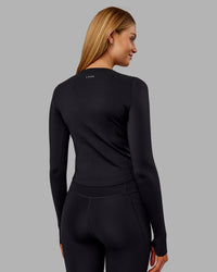 Woman wearing Embrace Thermal Long Sleeve Tee - Black | Model:Ella | Size:S