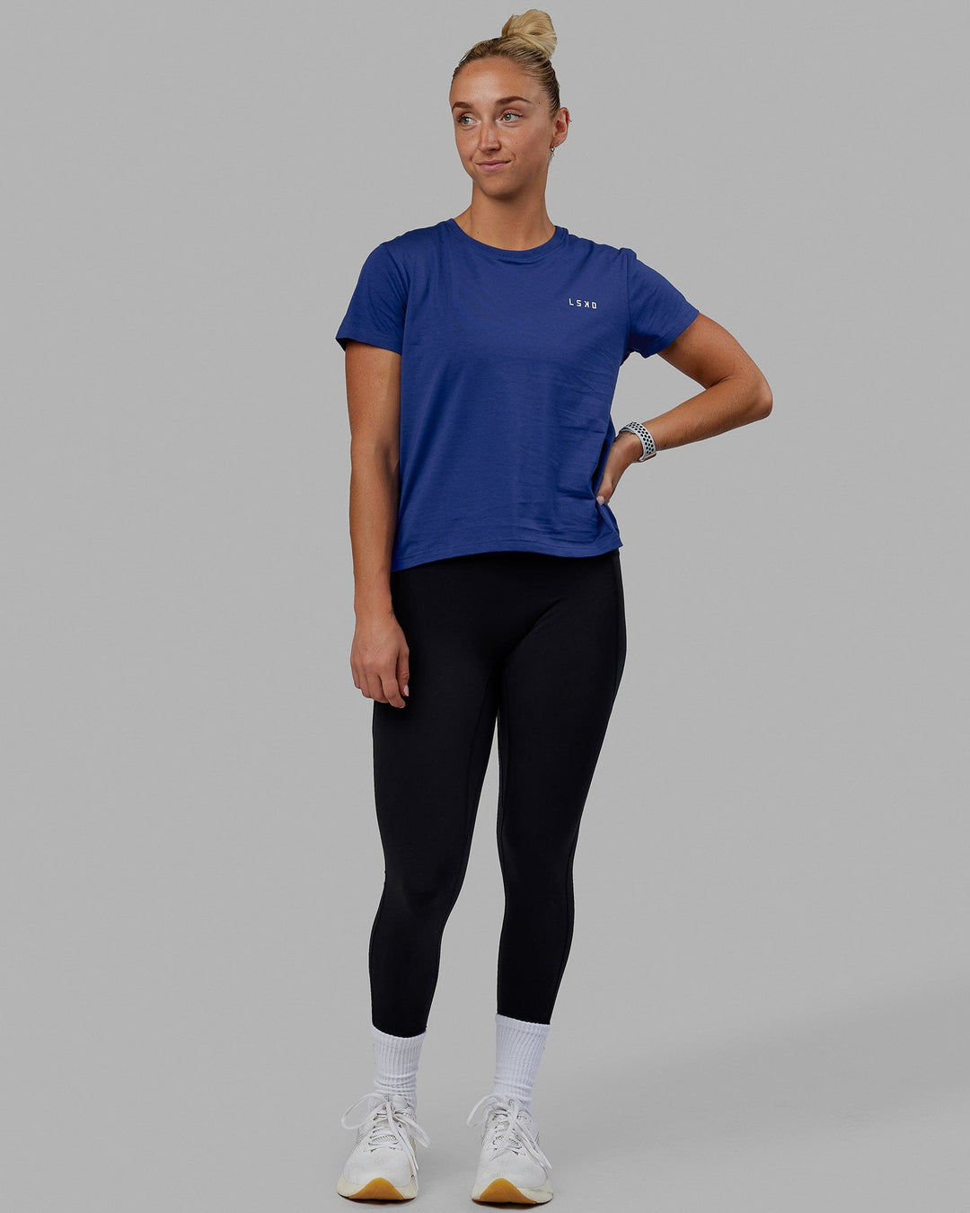 Woman wearing Endeavour FLX Cotton Tee - Galactic Cobalt-White
