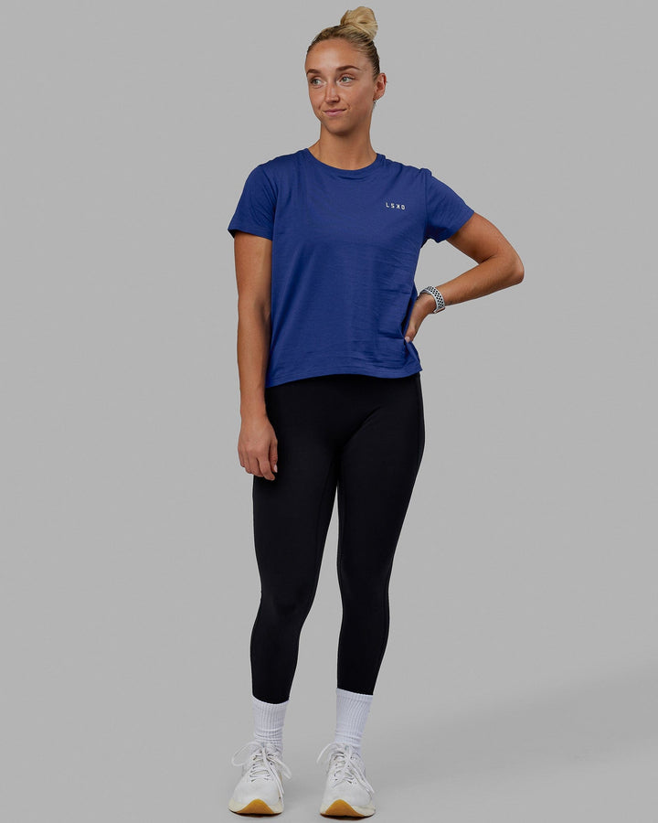 Woman wearing Endeavour FLX Cotton Tee - Galactic Cobalt-White
