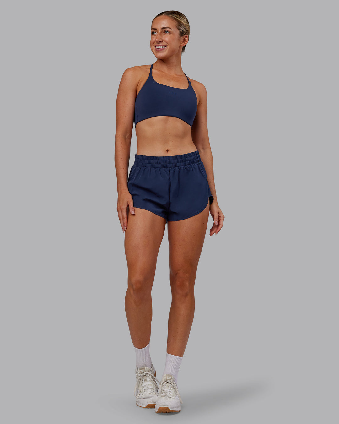 Woman wearing Energy 1.8&quot; Training Short - Future Navy | Model:Paris | Size:S